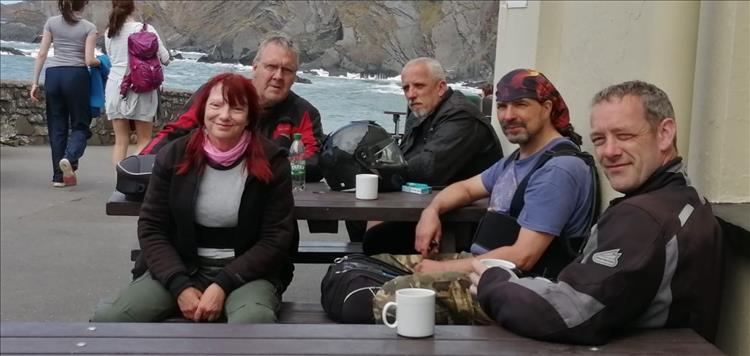 The 5 friends together at a table