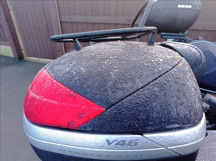 A hard frost has frozen raindrops onto Ren's backbox