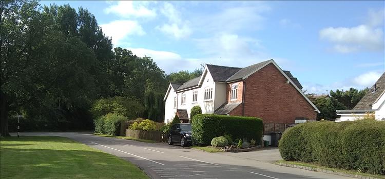 A modern house, nicely styled and in keeping with the village