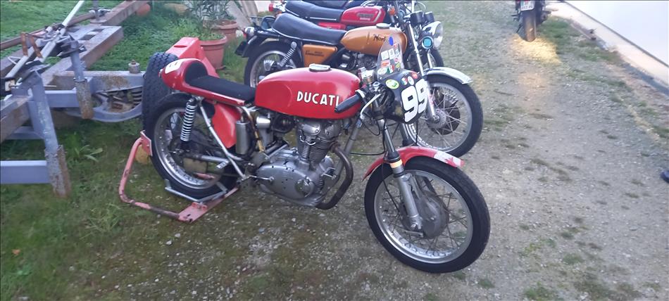 A classic red Ducati Single