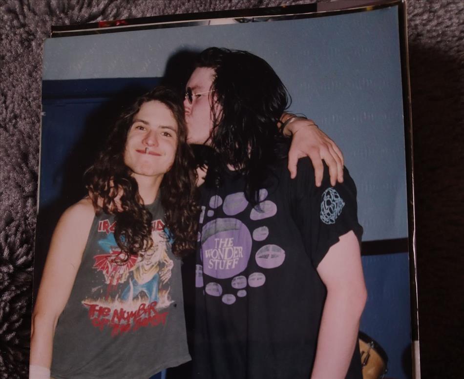 A very young 18 year old ren with a cigarette and long long hair