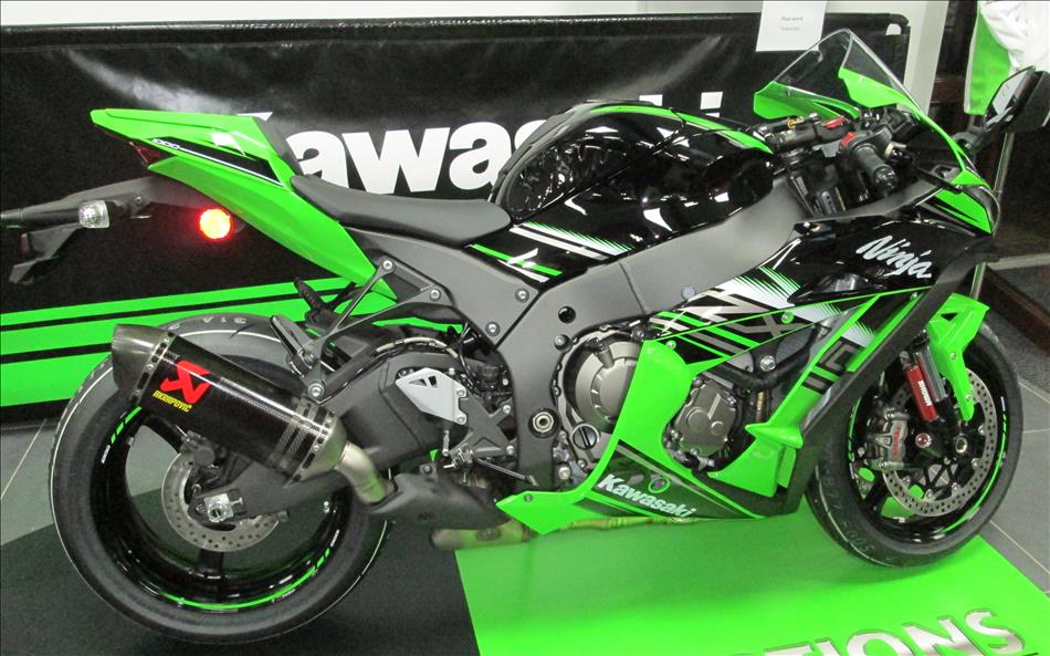 A bright green and black Ninja 1000 sports bike