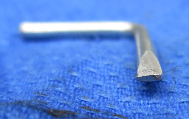 DIY tensioner tool, a wire filed to a screwdriver like end