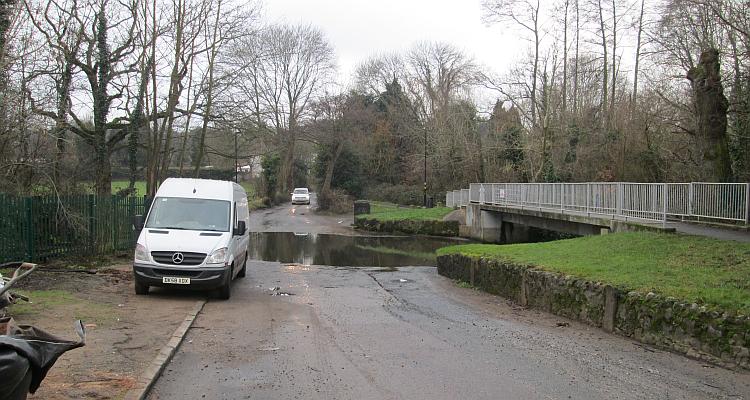 A ford across the road in the ordinary leafy suburbs of Birmingham
