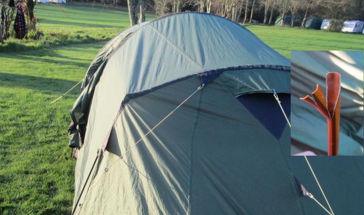 The tent has a peculiar angle due to the broken pole, there's an inset of the snapped aluminium tube