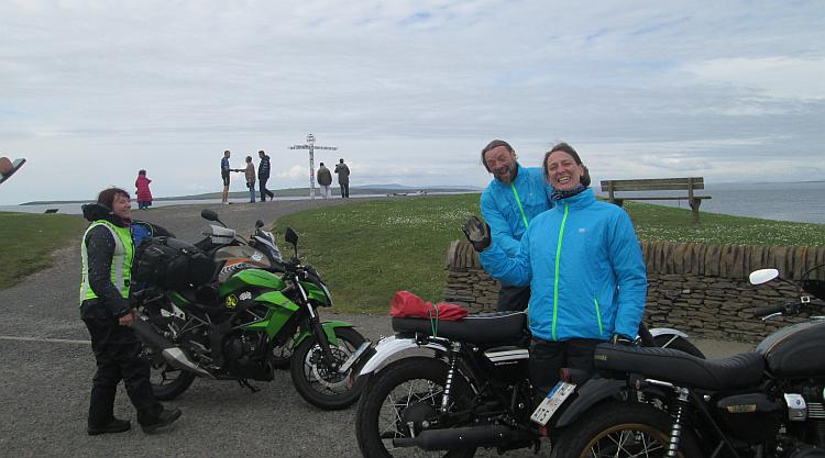 The German couple give the thumbs up too in their bright blue waterproof jackets