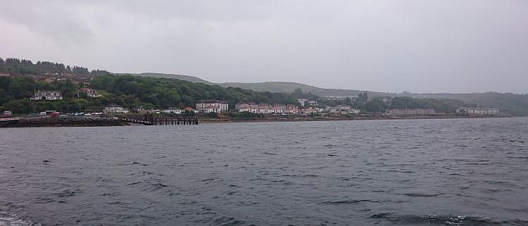 Hills rolls down into the massive and wide loch or estuary of the Clyde