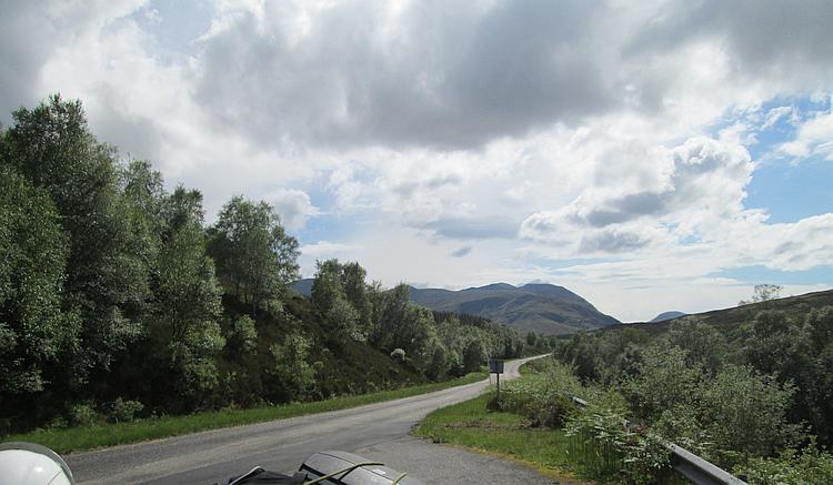 Big skies with swollen clouds over the mountains and hills along the A832