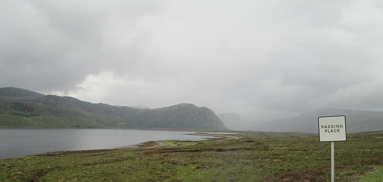 Thick black clouds cover the mountain tops as the rain comes back in once more